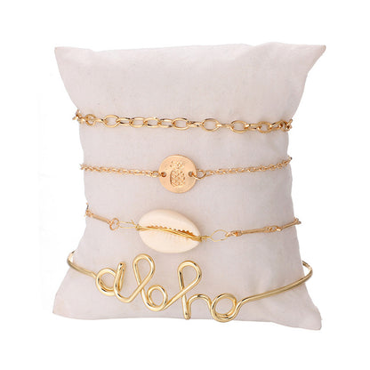 Shell and 18K Gold-Plated 'Aloha' Bracelet Set, jewelry gift sets for women, vintage-inspired design, lifestyle look