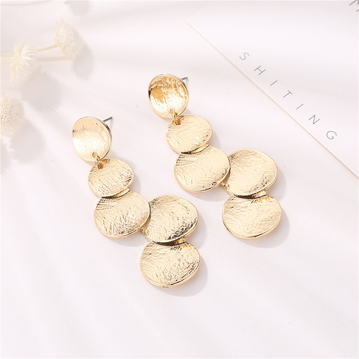 Elegant 18K gold-plated coin cluster drop earrings featuring shimmering metal discs for a stylish touch.