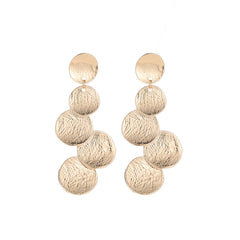 Eye-catching 18K gold-plated coin cluster earrings made from metal discs, ideal for elevating your accessory game.
