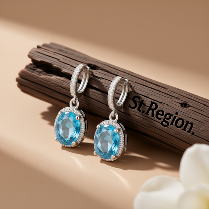 Sea Blue Crystal and Silver-Plated Halo Oval Drop Earrings, silver huggie earrings, everyday style, front view