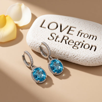 Sea Blue Crystal and Silver-Plated Halo Oval Drop Earrings, silver huggie earrings, everyday style, lifestyle look