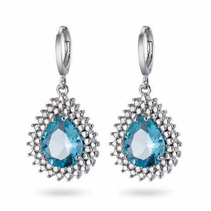 Blue Crystal and Silver-Plated Pear-Cut Halo Drop Earrings, silver huggie earrings, botanical inspired, side view
