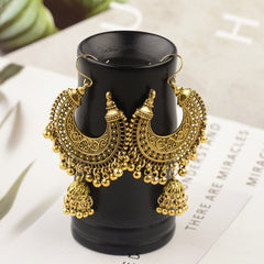 Eye-catching gold-plated jhumka earrings embellished with beads, designed to enhance your look with a sophisticated touch.