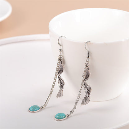 Turquoise and Silver-Plated Feather Twist Drop Earrings, silver drop earrings for women, botanical inspired, detail close-up