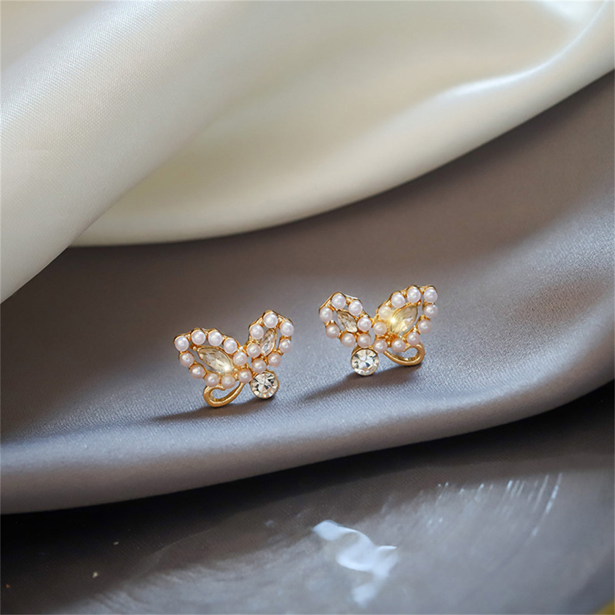 Pearl and Cubic Zirconia Embellished Butterfly Stud Earrings, stud earrings for women, vintage-inspired design, front view