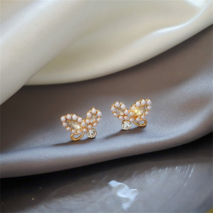 Pearl and Cubic Zirconia Embellished Butterfly Stud Earrings, stud earrings for women, vintage-inspired design, front view