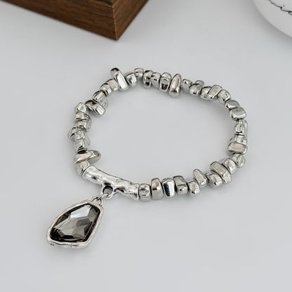 Gray Crystal and Silvertone Beads Irregular Charm Stretch Bracelet, everyday style, side view