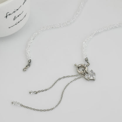 Clear Crystal and Acrylic Silvertone Heart Pendant Tassel Toggle Necklace, vintage-inspired design, detail close-up