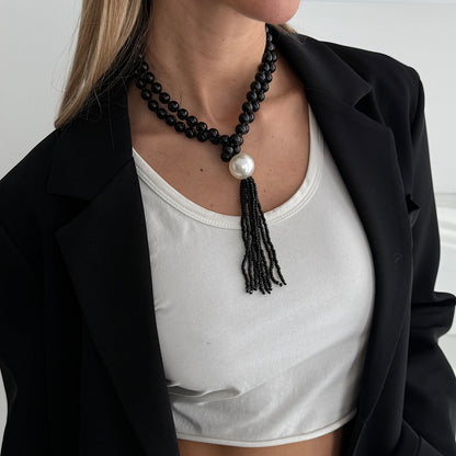 Black Resin and Pearl Big Ball Tassel Necklace, dainty minimalist design, lifestyle look
