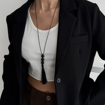 Black Resin and Polyster Tassel Necklace, botanical inspired, styled look