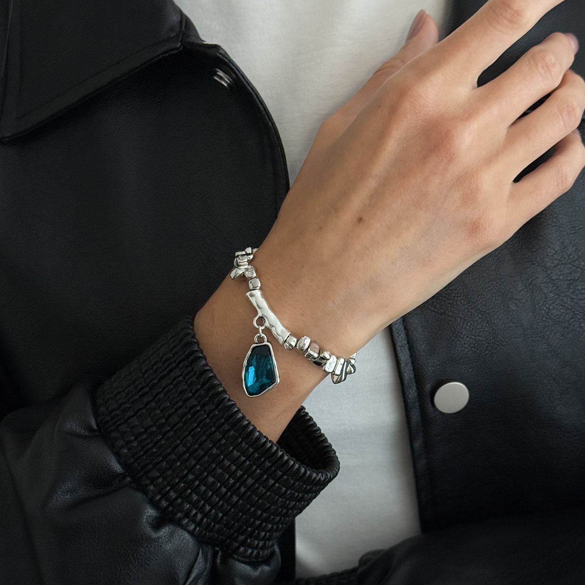 Blue Crystal and Silvertone Beads Irregular Charm Stretch Bracelet, botanical inspired, lifestyle look