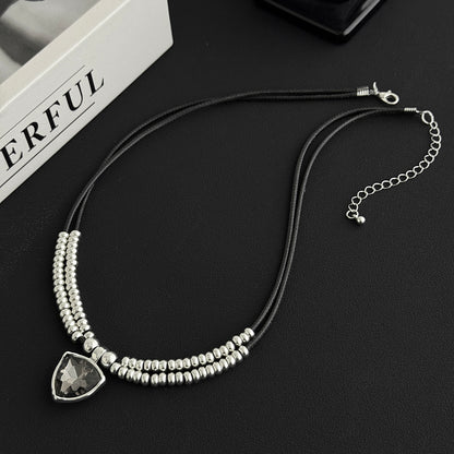 Black Polyster and Crystal Silvertone Beaded Triangle Pendant Necklace, botanical inspired, side view