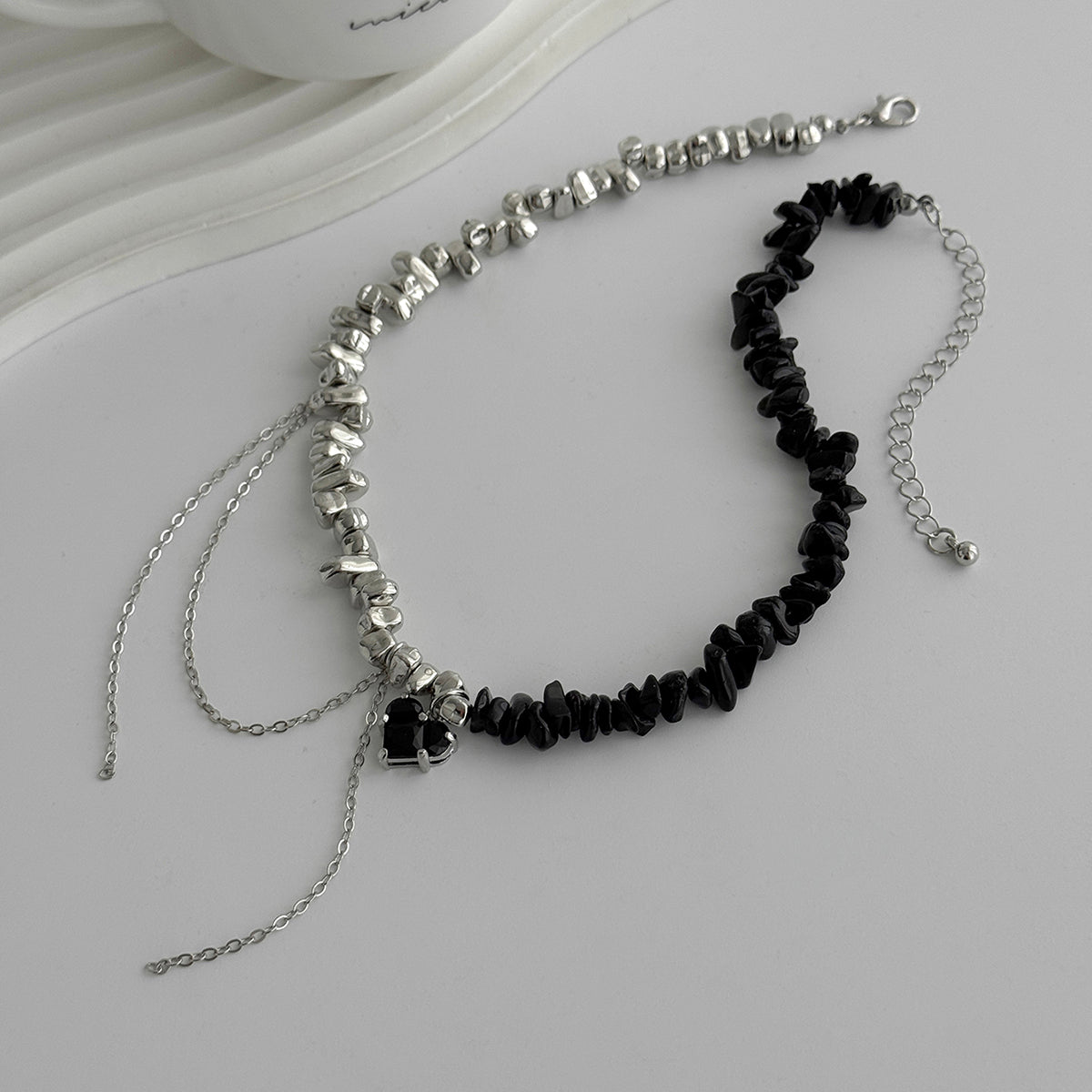 Black Acrylic and Crystal Silvertone Heart Tassel Patchwork Collar Necklace, vintage-inspired design, detail close-up