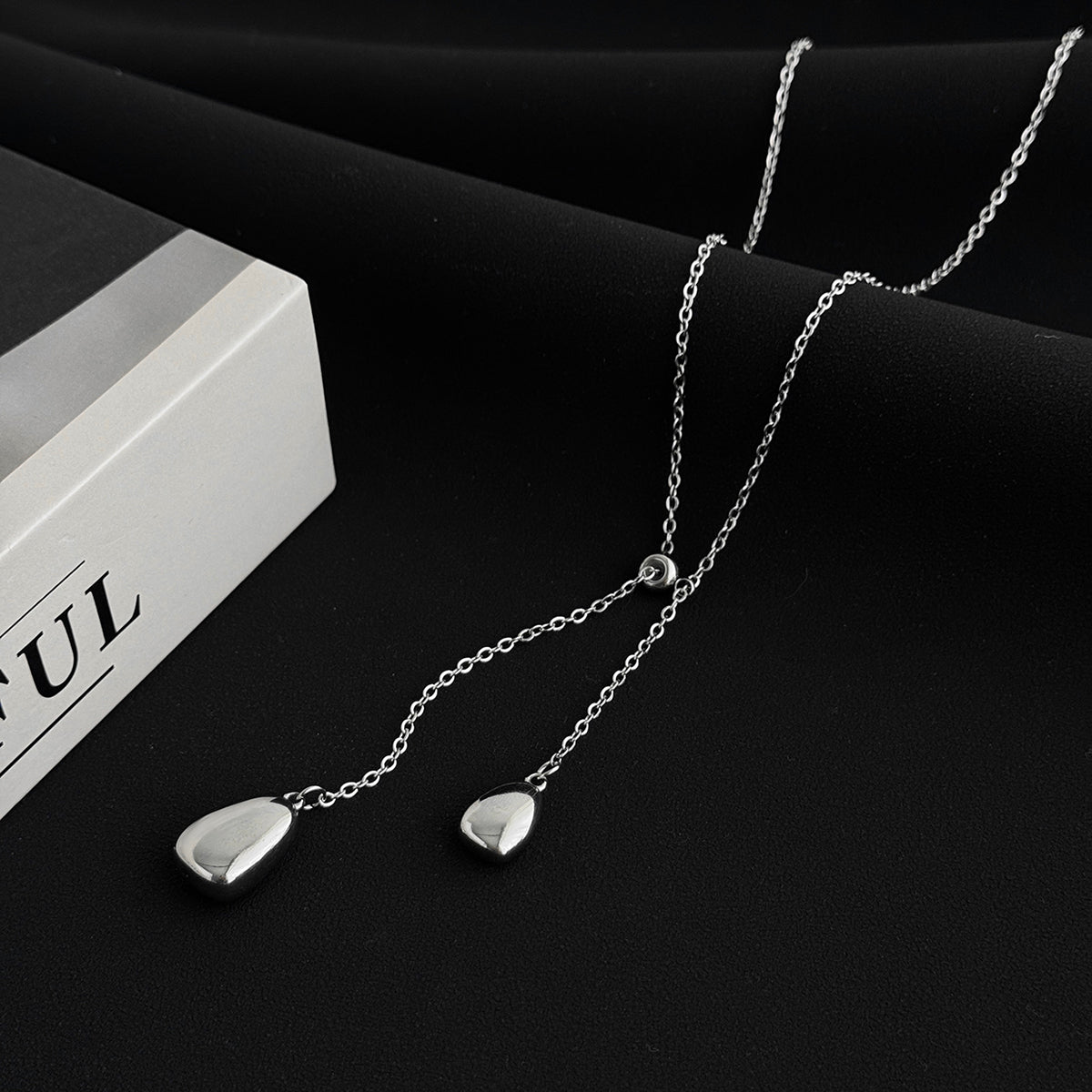 Silvertone Dual-Drop Lariat Necklace, dainty minimalist design, side view