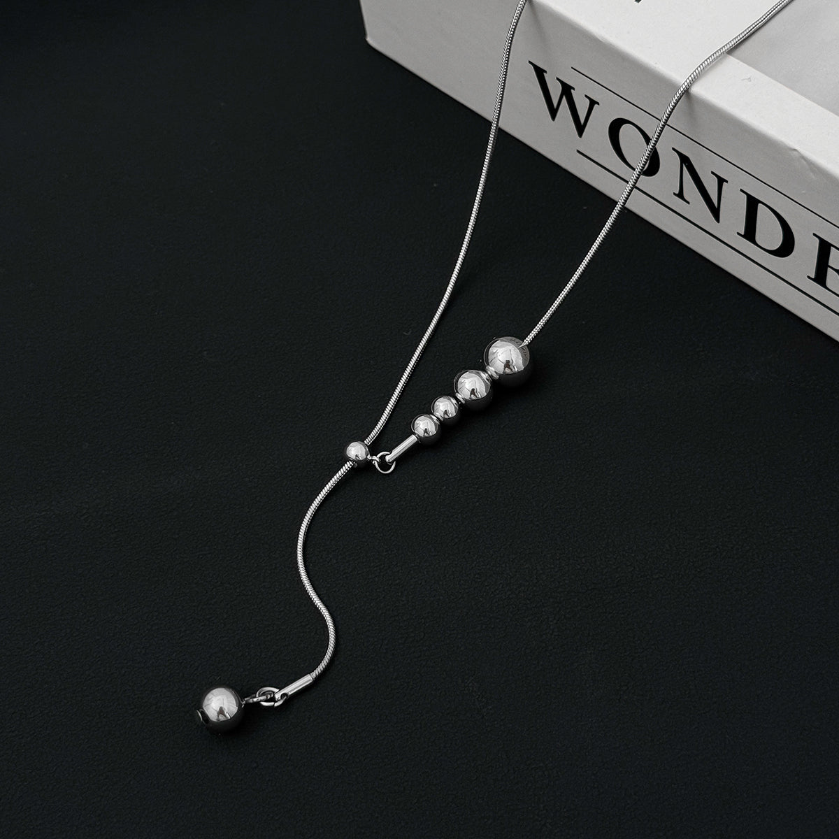 Silvertone Beaded Lariat Necklace, botanical inspired, side view