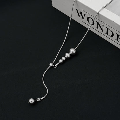 Silvertone Beaded Lariat Necklace, botanical inspired, side view
