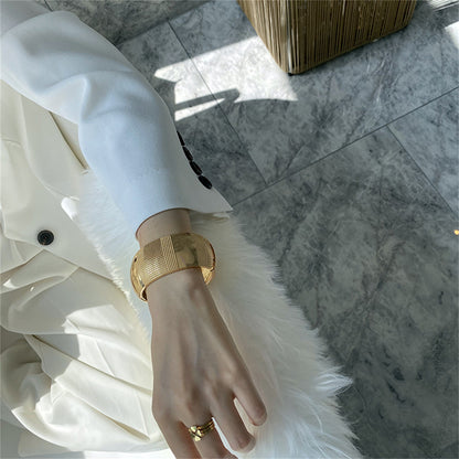 18K Gold-Plated Embossed Wavy Pattern Bangle, gold bangle bracelet, vintage-inspired design, styled look