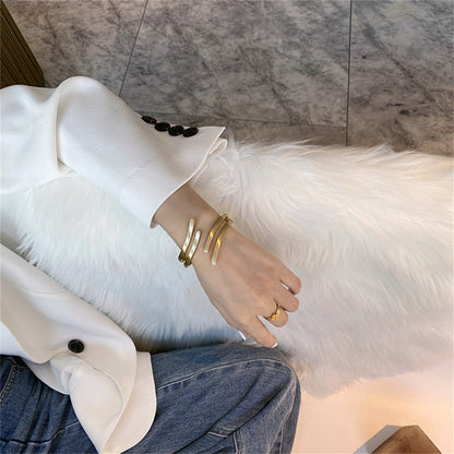 18K Gold-Plated Wing Open Bypass Coil Bracelet, gold bangle bracelet, everyday style, side view