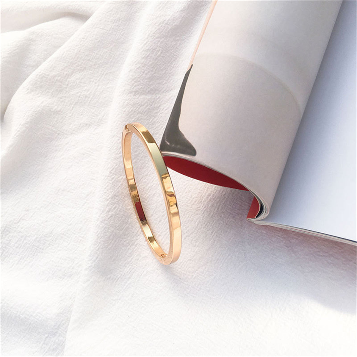 Cubic Zirconia and 18K Gold-Plated Hinge Bangle, gold bangle bracelet, botanical inspired, detail close-up