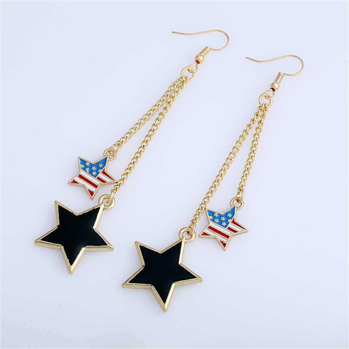 Celebrate Independence Day with these elegant 18K gold-plated American flag and star drop earrings, a true statement piece.