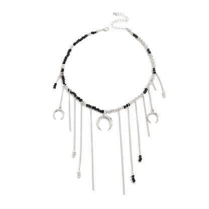 Black Acrylic and Silvertone Moon Pendant Tassel Necklace, vintage-inspired design, front view