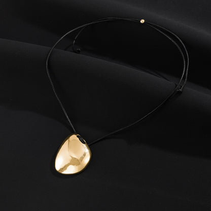 Black Polyster and Goldtone Irregular Pendant Necklace, elegant gift for her, detail close-up