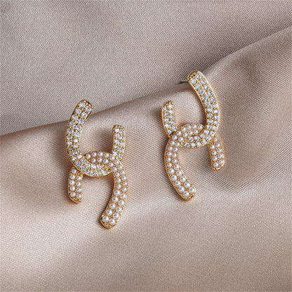 Pearl and Cubic Zirconia Interlocked Stud Earrings, stud earrings for women, botanical inspired, side view