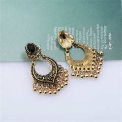Chic 18K gold-plated earrings adorned with black stones and beads, featuring a trendy bell-tassel drop design.