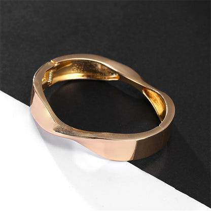 18K Gold-Plated Twisted Hinge Bangle, gold bangle bracelet, dainty minimalist design, detail close-up