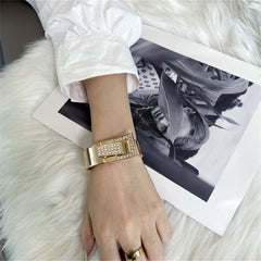 Cubic Zirconia & 18K Gold-Plated Buckle Charm Hinge Bangle