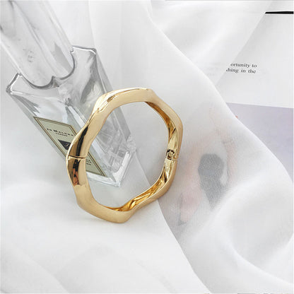 18K Gold-Plated Wave Hinge Bangle, gold bangle bracelet, everyday style, detail close-up