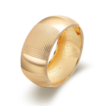 18K Gold-Plated Embossed Wavy Pattern Bangle, gold bangle bracelet, vintage-inspired design, side view