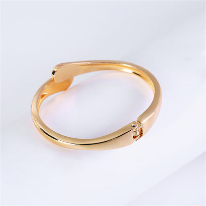 18K Gold-Plated Drop Bypass Hinge Bangle, gold bangle bracelet, botanical inspired, styled look