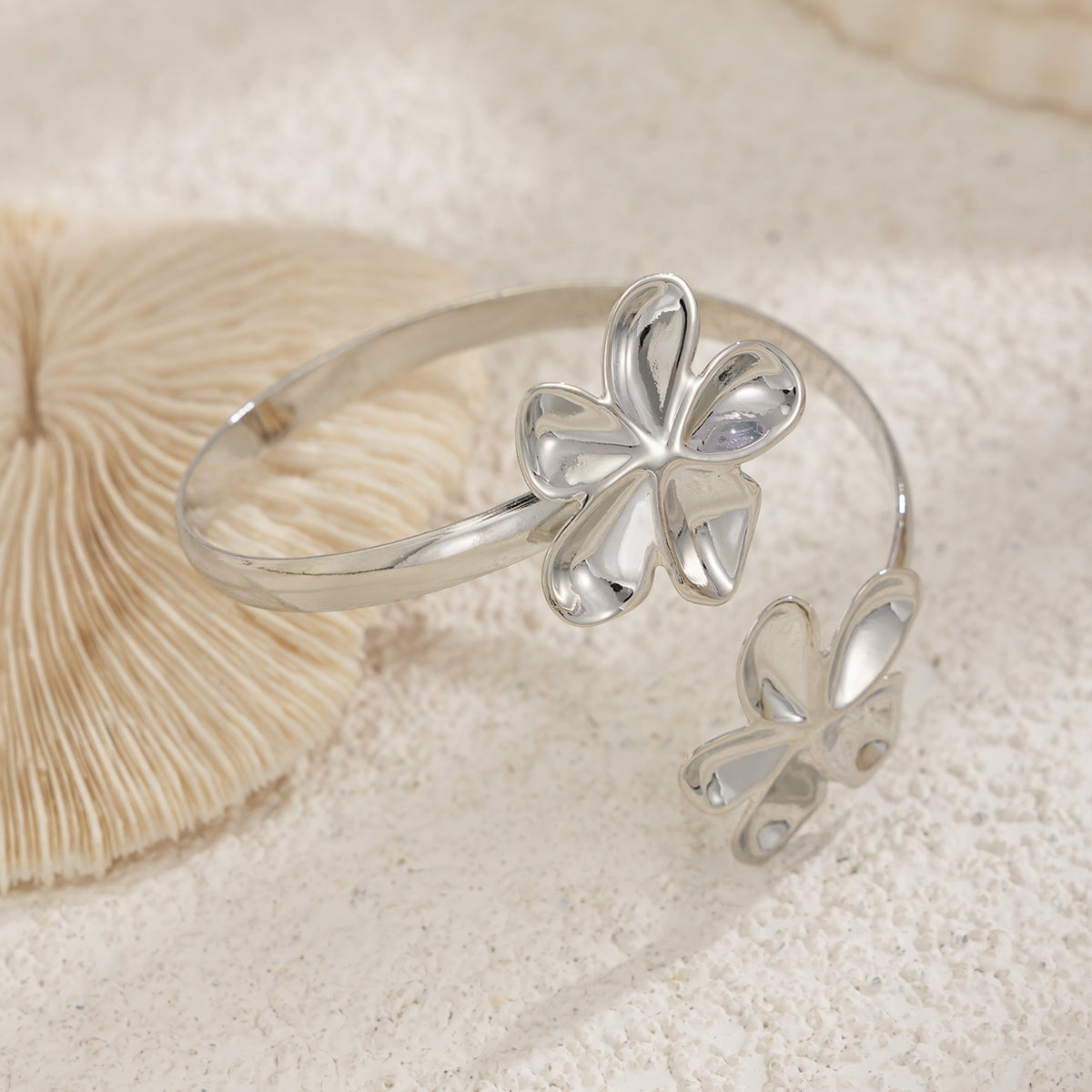 Silvertone Dual-Flower Bypass Arm Cuff, vintage-inspired design, side view