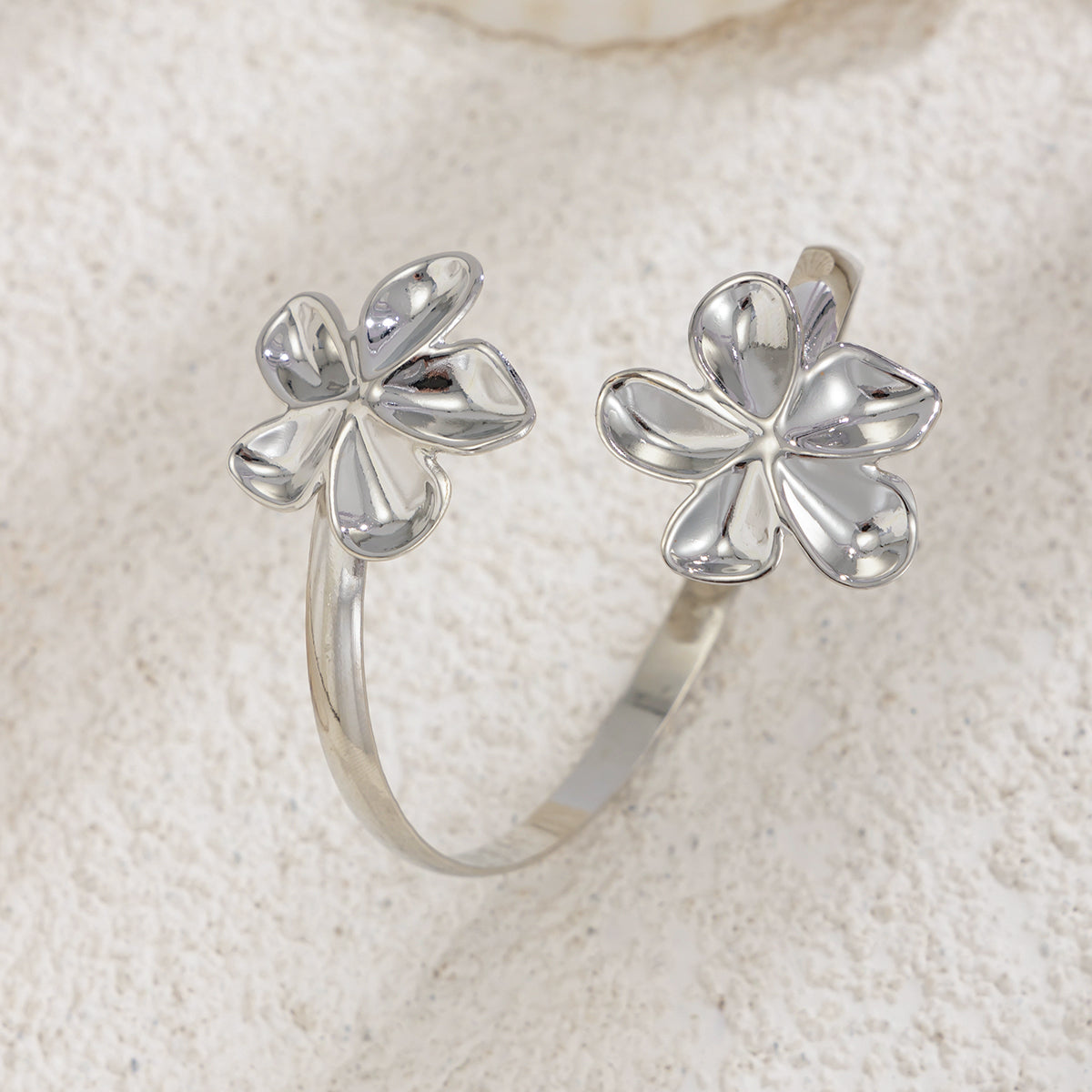 Silvertone Dual-Flower Bypass Arm Cuff, vintage-inspired design, detail close-up