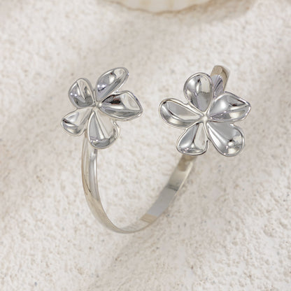 Silvertone Dual-Flower Bypass Arm Cuff, vintage-inspired design, detail close-up