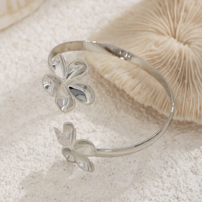Silvertone Dual-Flower Bypass Arm Cuff, vintage-inspired design, lifestyle look