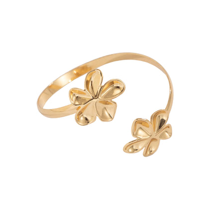 Goldtone Dual-Flower Bypass Arm Cuff, botanical inspired, front view