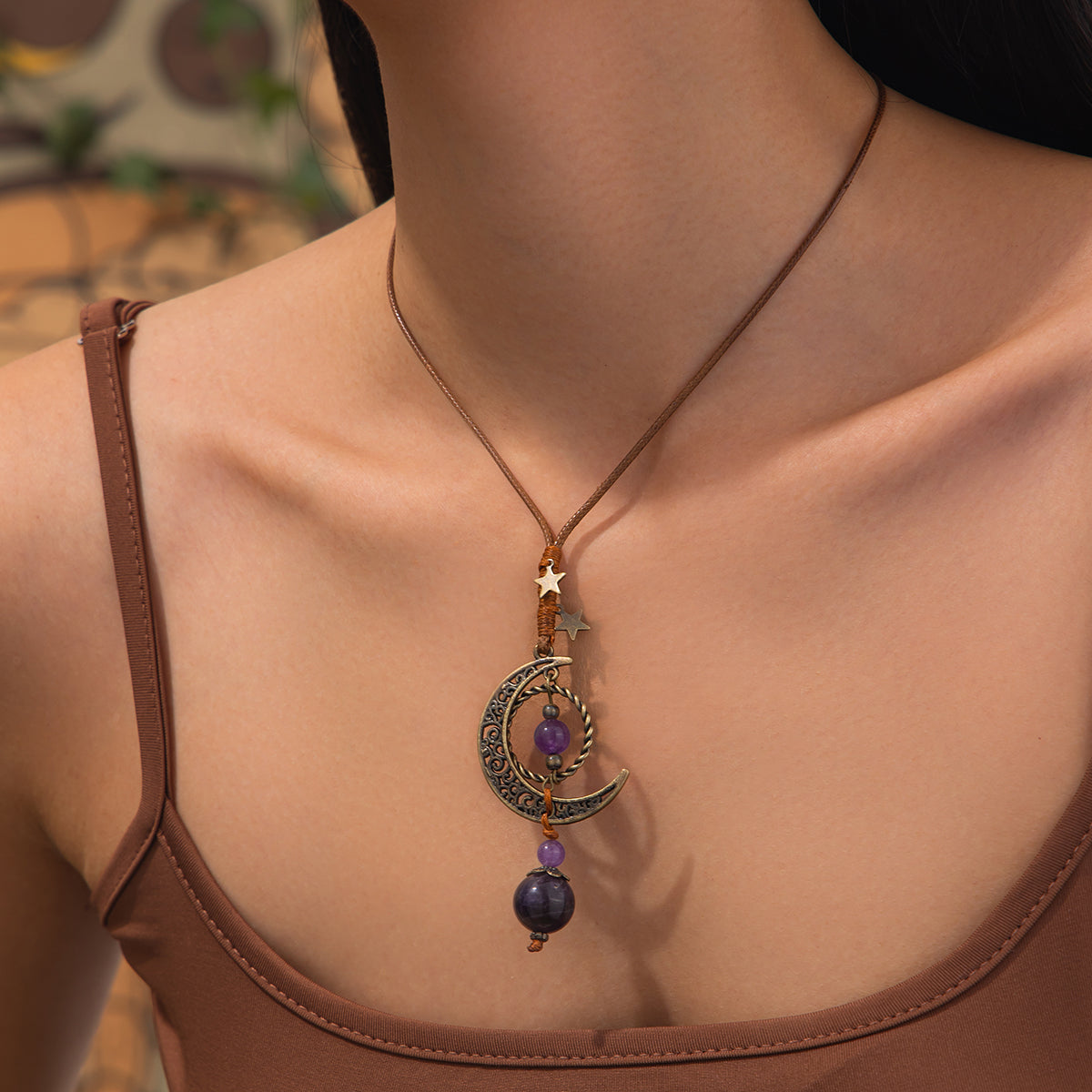 Purple Crystal and Polyster Goldtone Bead Moon Pendant Necklace, vintage-inspired design, lifestyle look