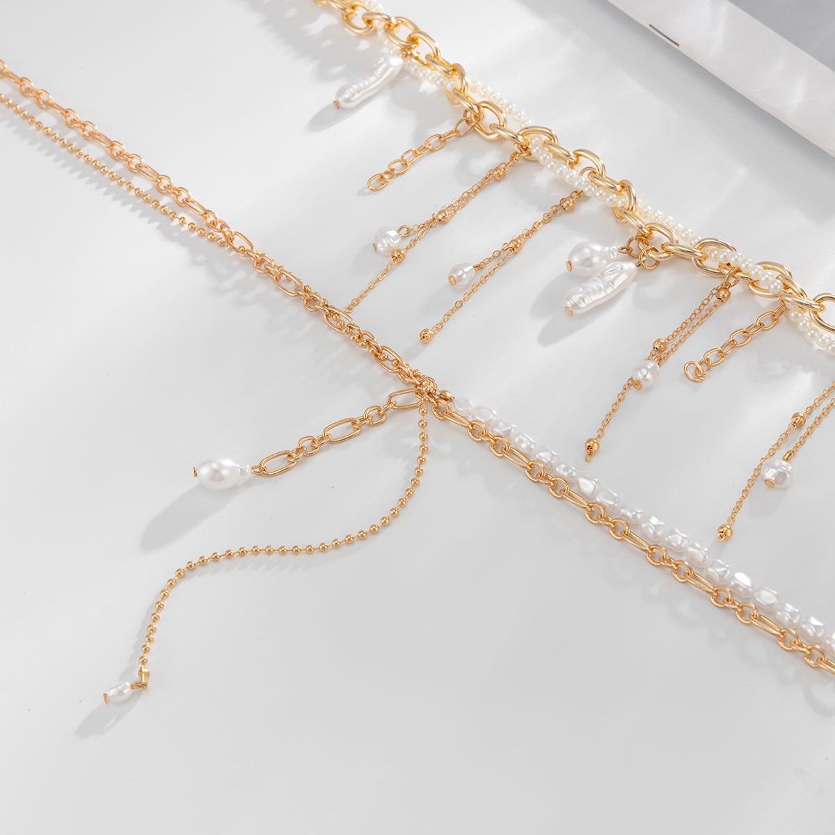Pearl and Goldtone Beads Tassel Drop Necklace Set, gold pendant necklace for women, everyday style, side view