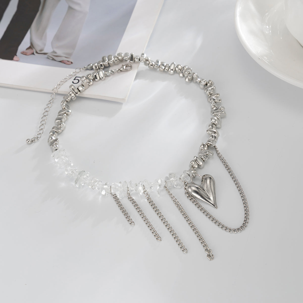 Clear Acrylic and Silvertone Heart Pendant Tassel Necklace, everyday style, side view