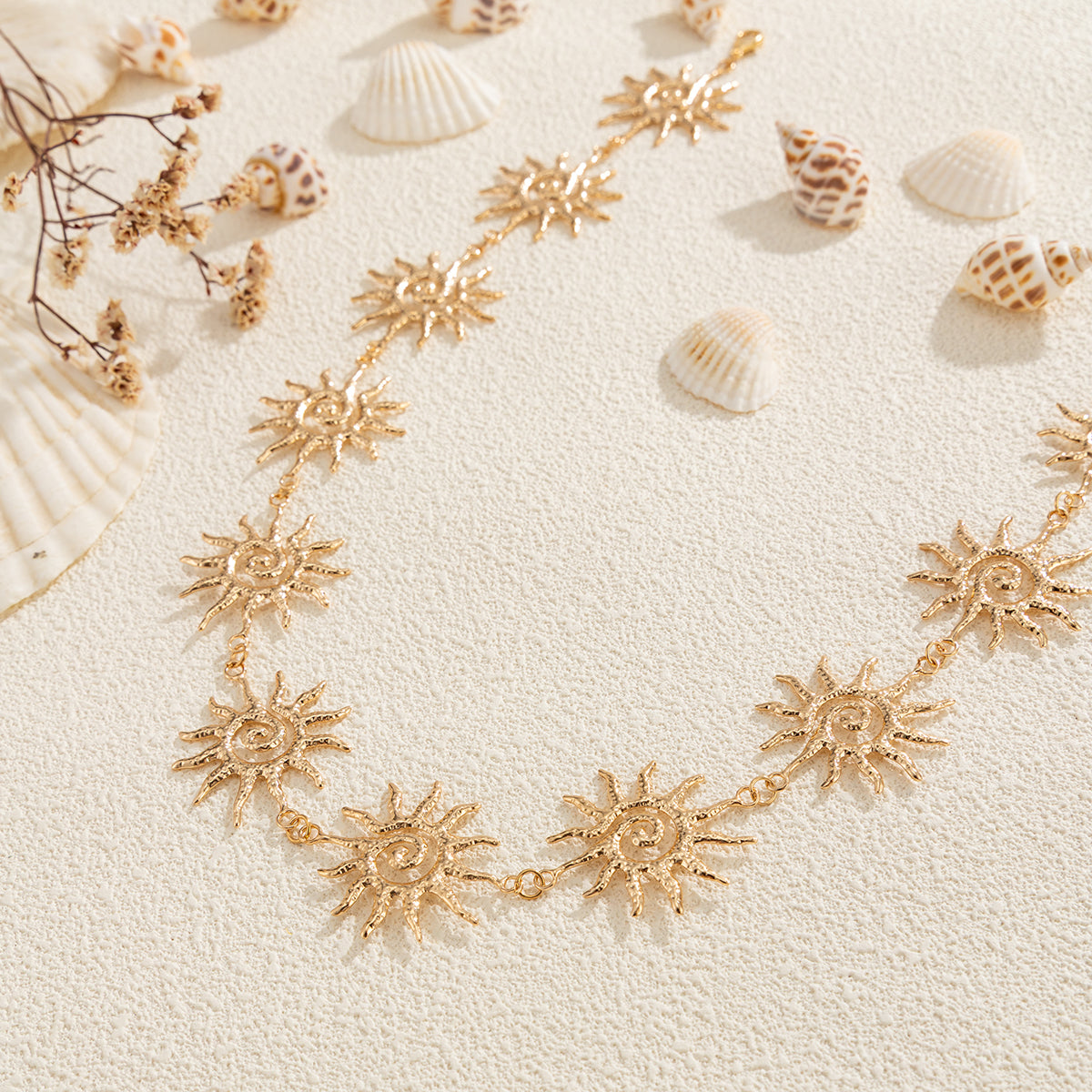 Goldtone Swirl Sun Charm Waist Chain, elegant gift for her, detail close-up