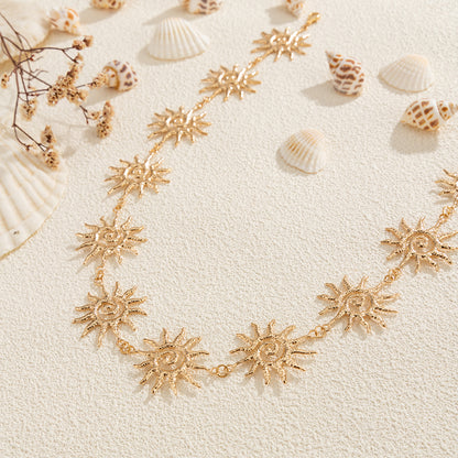 Goldtone Swirl Sun Charm Waist Chain, elegant gift for her, detail close-up