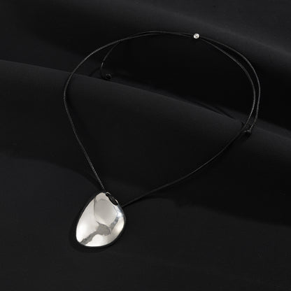 Black Polyster and Silvertone Irregular Pendant Necklace, elegant gift for her, side view