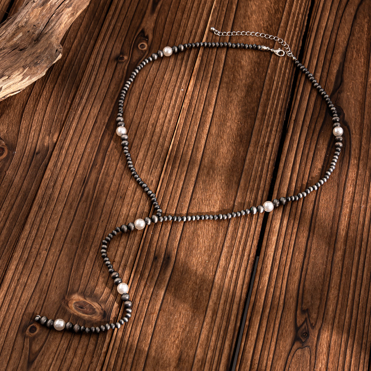 Dark Resin and Pearl Silvertone Beaded Y-Necklace, vintage-inspired design, side view