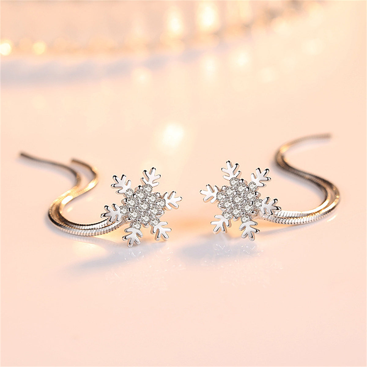 Cubic Zirconia and Silver-Plated Snowflake Tassel Ear Jackets, silver drop earrings for women, everyday style, side view