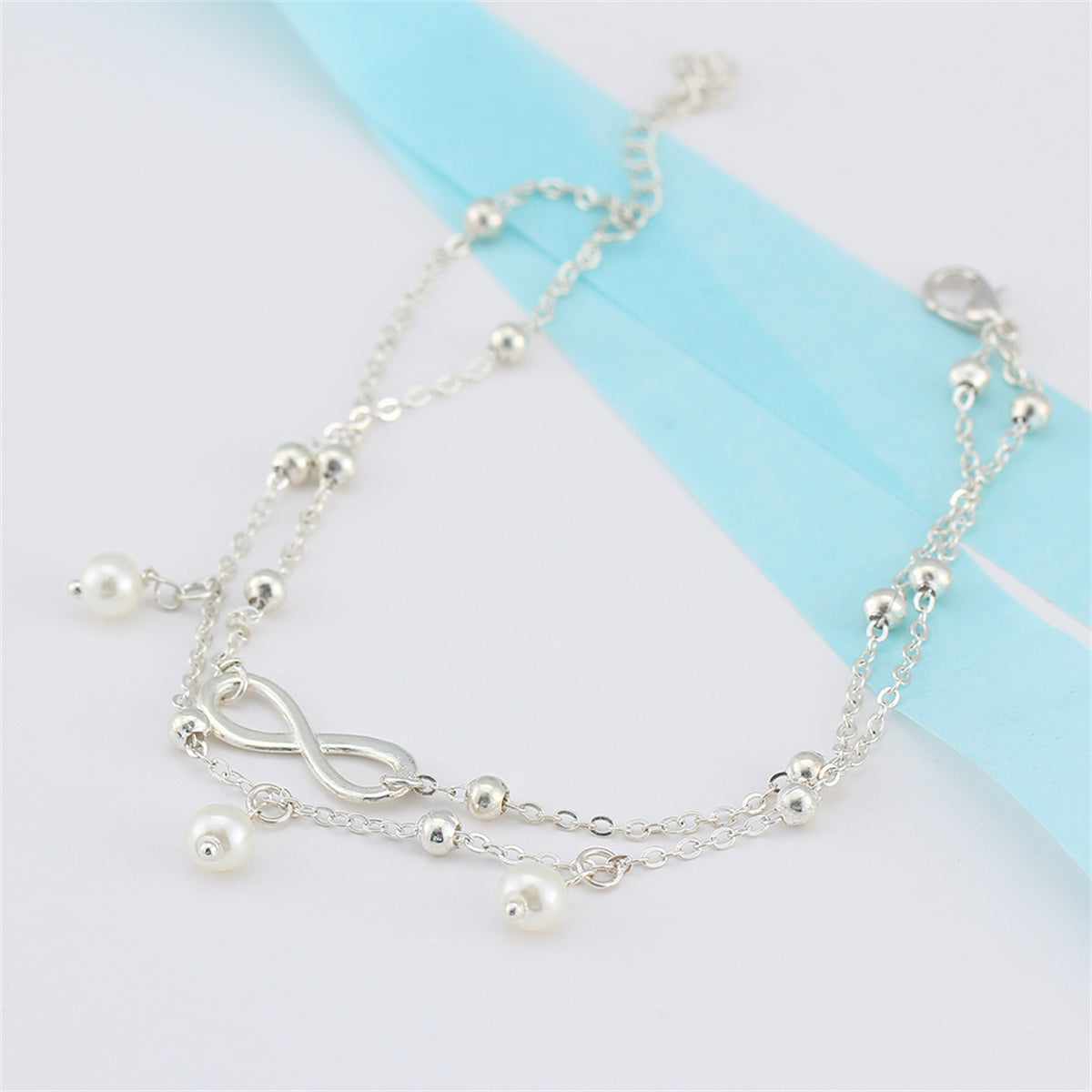 Pearl and Silver-Plated Infinity Charm Layer Anklet, silver anklet bracelet, botanical inspired, detail close-up