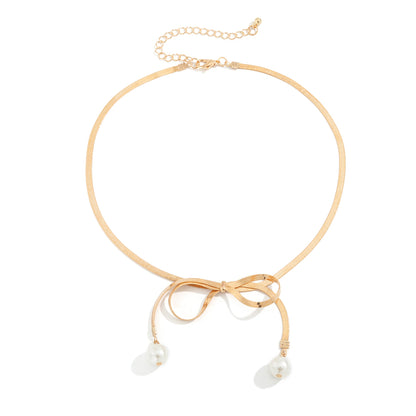 Pearl and 18K Gold-Plated Bow Choker Necklace, gold pendant necklace for women, dainty minimalist design, front view