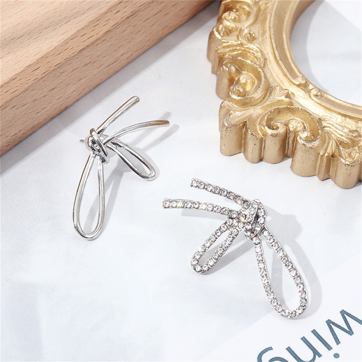 Cubic Zirconia and Silver-Plated Knot Stud Earrings, silver stud earrings for women, dainty minimalist design, lifestyle look