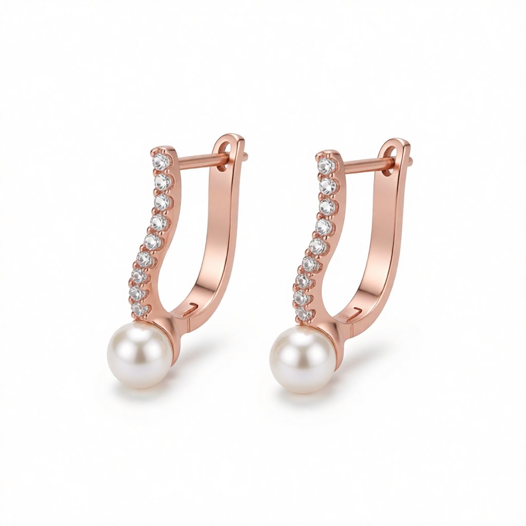 Pearl and 18K Rose Gold-Plated Huggie Earrings, rose gold huggie earrings, dainty minimalist design, side view